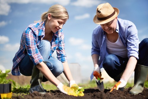 Gardening team carrying out a safe worksite risk assessment